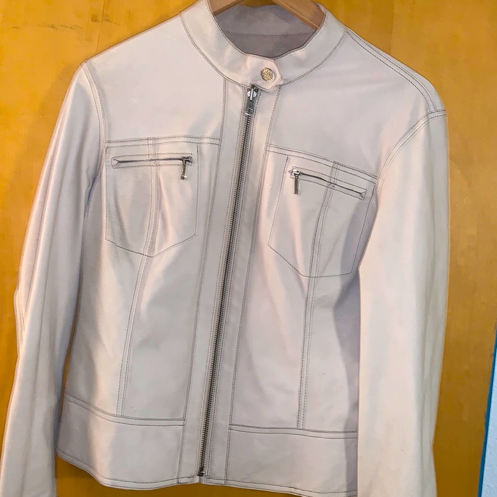 June reversible tan leather jacket, with both suede and leather textures.